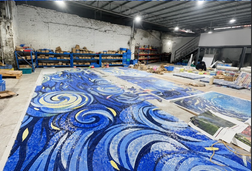Large blue wave mosaic artwork assembled for an architectural project