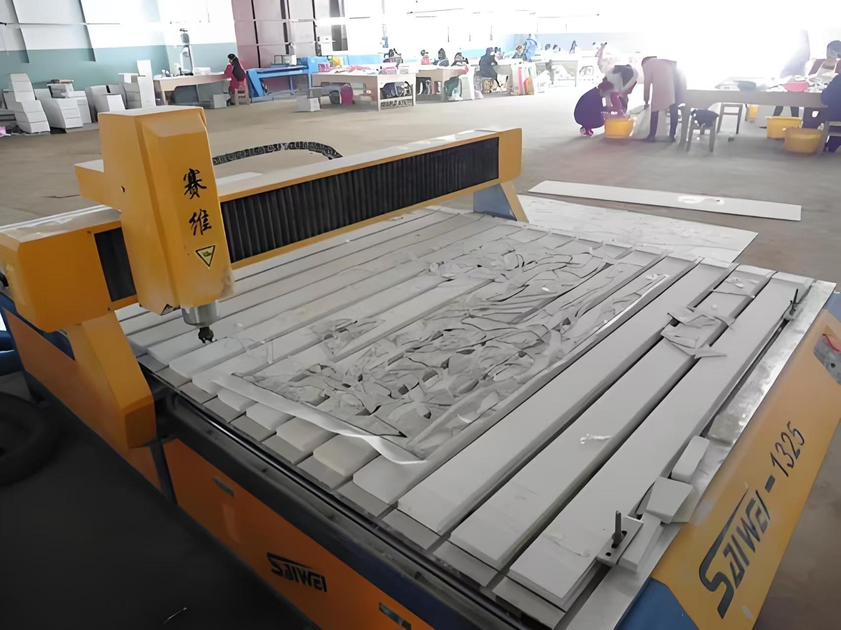 Mosaic cutting and processing equipment in the HUITLONG MOSAIC factory